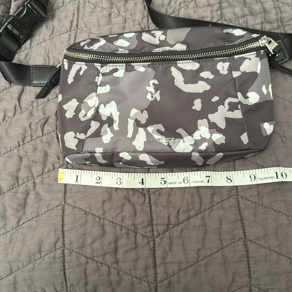 Tumi. New without tags. Endless pockets. - Picture 8 of 10